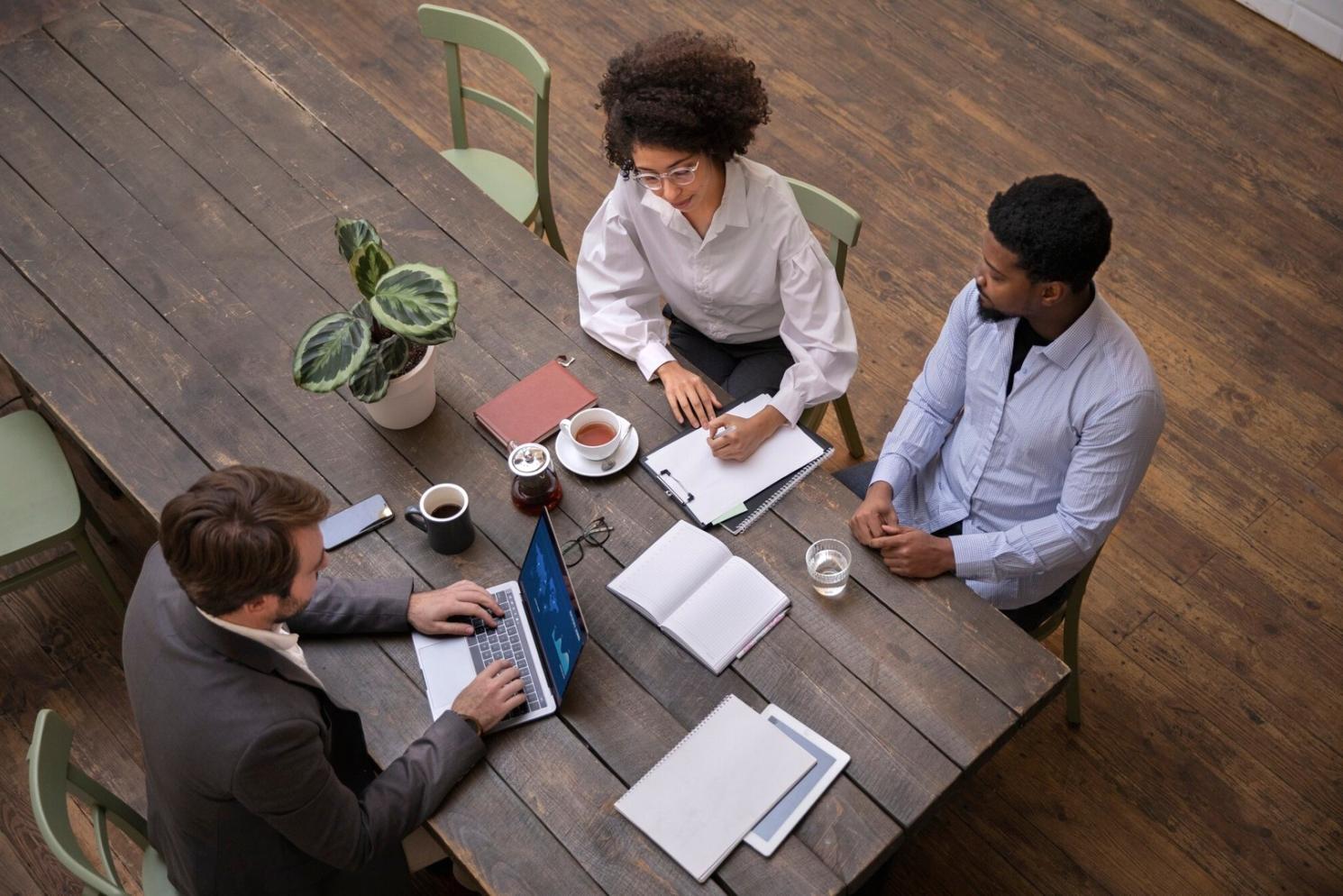 Students analyzing financial models in collaborative setting